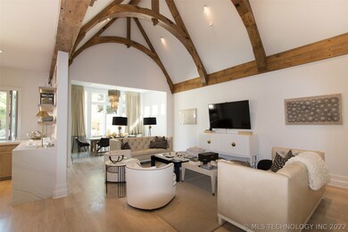 This Greatroom flows to an informal dining space a