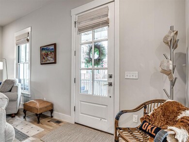 Entryway featuring light wood finished floors, vis