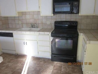 New Flooring in kitchen, newer appliances with til