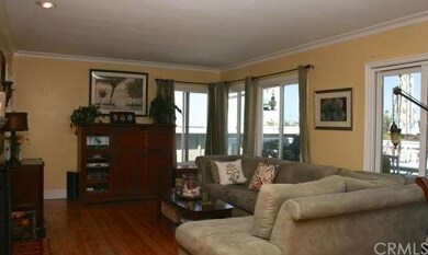 Bright and open living room with oak hardwood floo