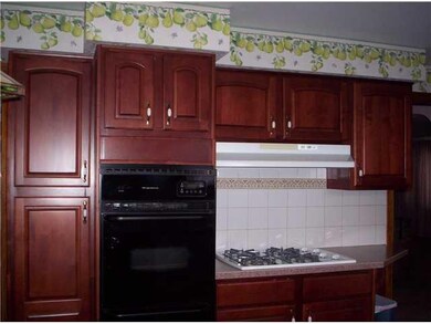 Kitchen. Built-in oven and range top, pantry and a