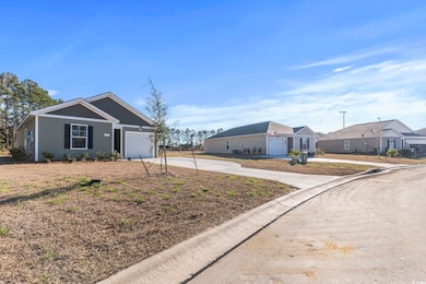 View of front of home featuring an attached garage