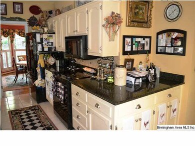 Refinished cabinetry, corian countertops, newer ap
