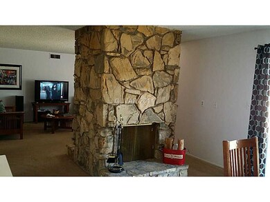 Property Photo. Awesome, stone, two-way fireplace