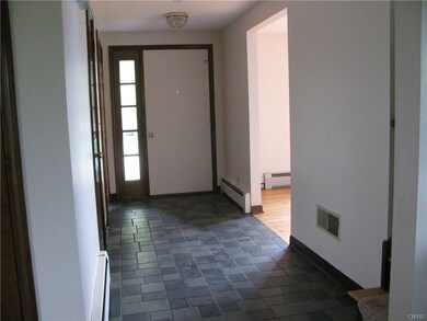 Beautiful tile floor in the spacious foyer