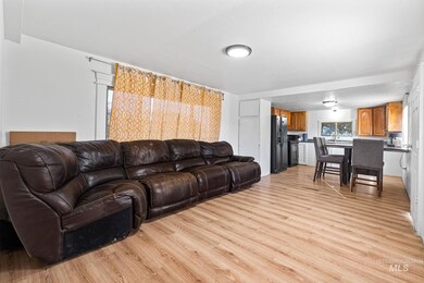 Living area with light wood-type flooring