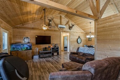 Living, Dining and hallway to Master bedroom