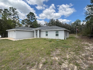 6589 N Bedstrow Blvd, Citrus Springs, FL 34434 - photo 2