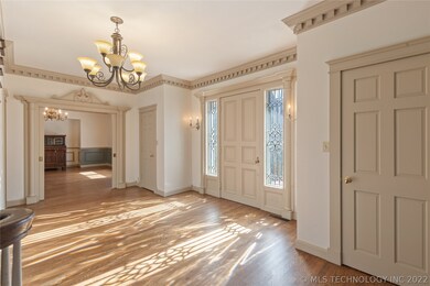 Front door entryway and foyer. Straight ahead is t