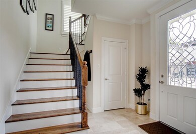 Entryway/Foyer with coat closet.
