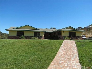 Lovely brick walkway leading to the home.