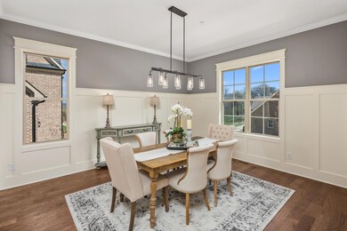 These beautiful floors are durable designer hardwood. 10 ft ceilings with 8 ft doors and Crown molding is used through out the main level. These beautiful hardwood floors are 3/4