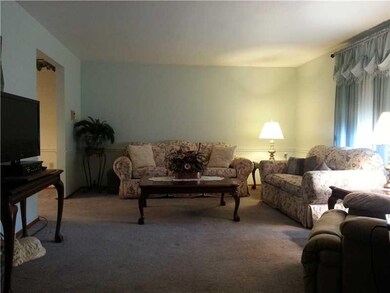 Living Room. Spacious formal living room with neut