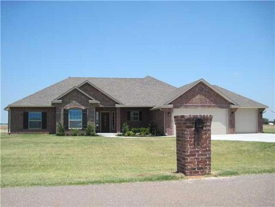 Exterior Front. Large covered front porch as well 