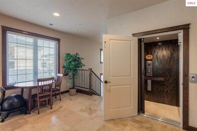 Garage on 1st floor with this elevator to the 2nd 