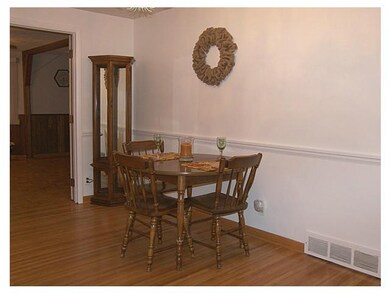 Dining Room Spacious formal dining room with hardw