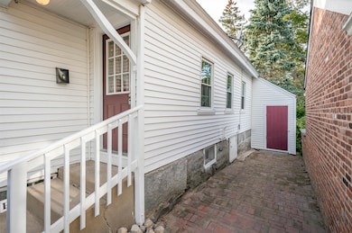 Side Entrance & Storage Shed