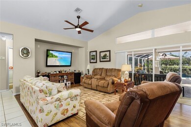 Great Room with hallway to Indoor Laundry Room and Guest Bedrooms and Bathroom on left.
