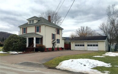 Street view with the large two car garage!