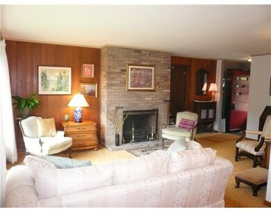 Living Room. Other view of living room. Gas log fi