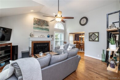 Hardwoods, c/f, wood burning fireplace with tile surround