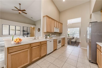 Virtually staged. Kitchen featuring UPDATED APPLIA