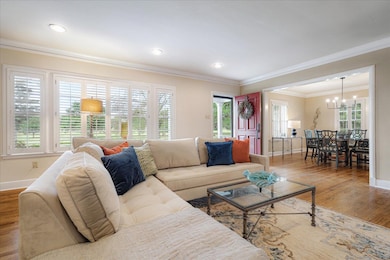 Living room featuring so much natural light and a 