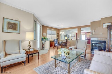 Formal living room with 2 way gas fireplace