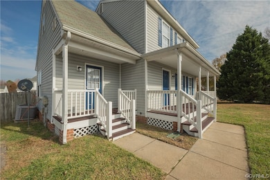 View of front of home featuring 2 entrances