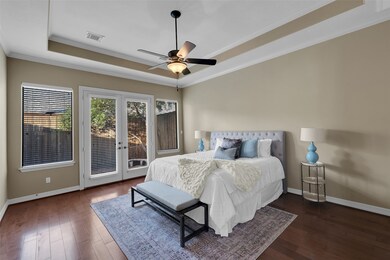 First floor primary suite is a retreat unto itself