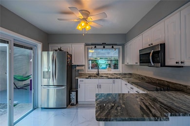 5124 Springwood Dr, Tampa, FL 33624 - photo 6