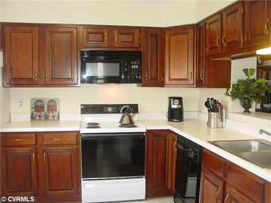 Kitchen - Plenty of beautiful cherry cabinets with