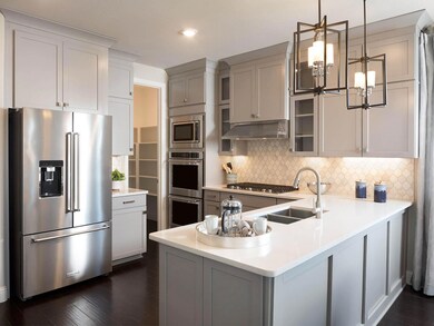 Photo is not of the actual home, but is an inspirational photo of builder’s model home and may depict options, furnishings, and/or decorator features that are not included