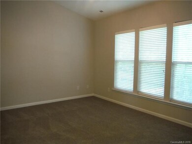 Master Bedroom, vaulted ceilings with ceiling fan.