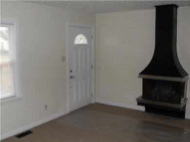 View of living room with fireplace