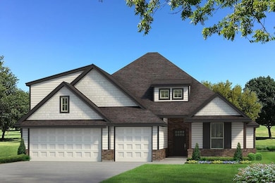 View of front of home with brick siding, a garage,