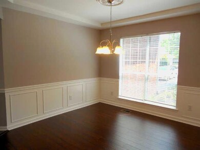 Formal Dining Room with Wide Plank Laminate Flooring