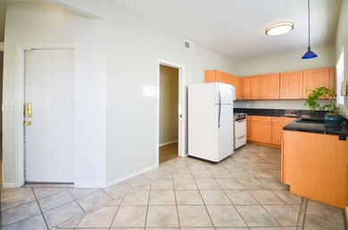 Kitchen with granite tile