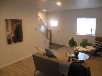 Open concept and custom stair rails.