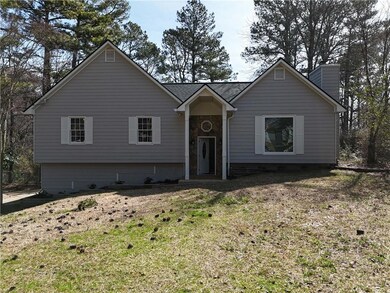 View of front of property featuring a chimney