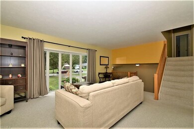 Living room. Stairs to the right take you up to 3 