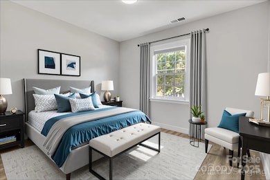 Walking into first bedroom (virtually staged).