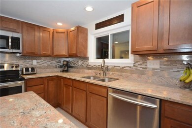 SS appliances & back splash, granite counters