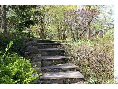 Patio/Deck Meandering walkway leads you to the rea
