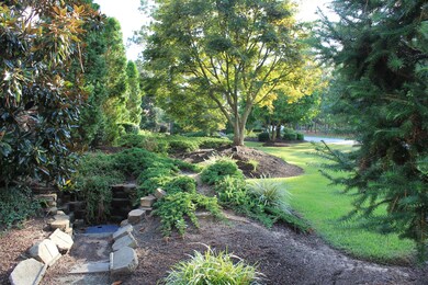4. a. Front left landscaping