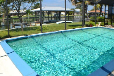 Pool overlooks Dock & Canal