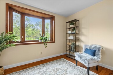 Large bay windows makes this room perfect for home