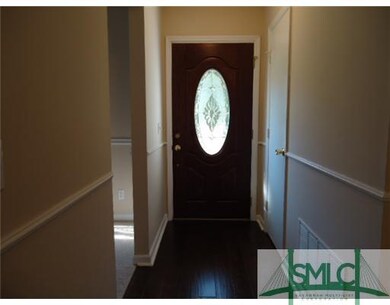 Other. Main entry with a beautiful new wood floor