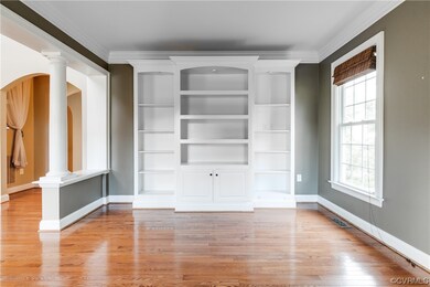 Alternate view of the home office with hardwood fl