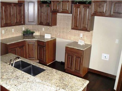 Granite counter with under mount sink and oil rubb